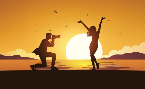 Photographer Capturing Woman at Sunset on the Beach Silhouette vector