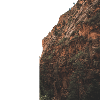 Majestic cliff face with rugged rock formations isolated on transparent background png