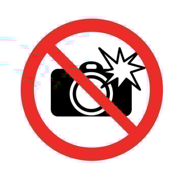 No flash photography warning icon with red prohibition sign and black camera symbol on white background vector