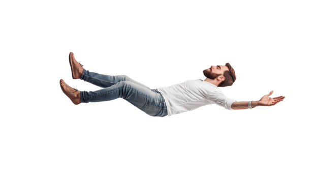 A man with a beard is floating with arms extended, creating an impression of weightlessness in a studio setting png