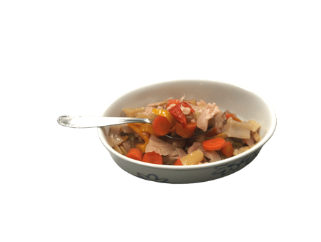 Spoon lifting chicken and vegetable stew from bowl with transparent background png