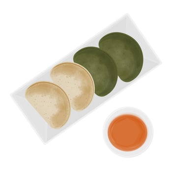 Assorted vegan dumplings on a plate vector