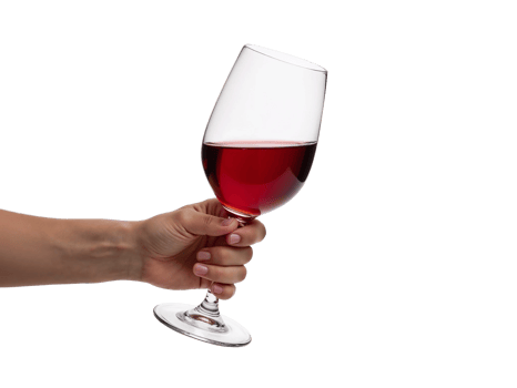 A hand holding a wine glass with red liquid png