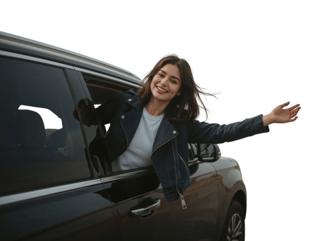 Smiling young woman with arms extended from car window showing a joyful journey png