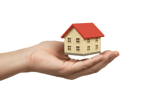 Human hand holding small model house with red roof for real estate concept. png