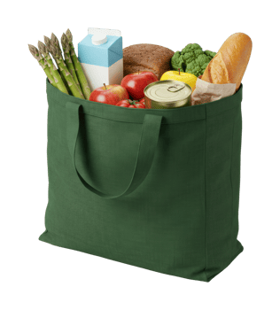 Green tote bag filled with groceries including fresh vegetables and bread. png