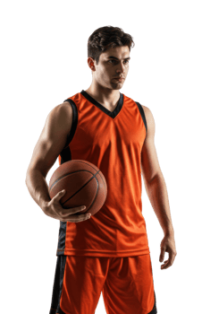 Young male basketball player in orange uniform holding ball. png