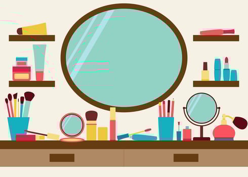 Makeup vanity with mirror and accessories vector