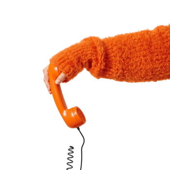 Retro telephone receiver held by a person wearing an orange fuzzy sweater with isolated clear space png