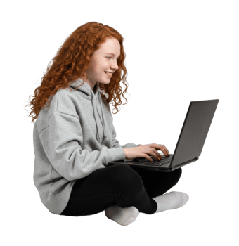 Young girl working on laptop at home indoor setting lifestyle cheerful environment engaged viewpoint. png