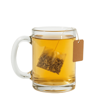 Aromatic infusion steeping within a pristine glass mug ready for comforting hydration ritual png
