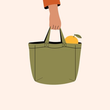 Hand holding green eco shopping bag with lemon illustration vector