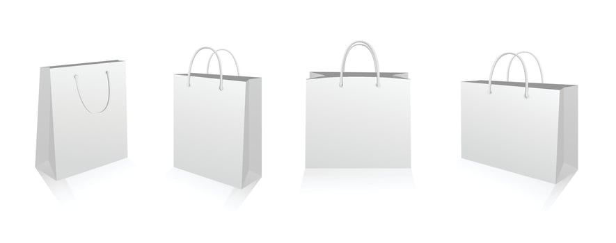 Four white shopping bags with handles vector