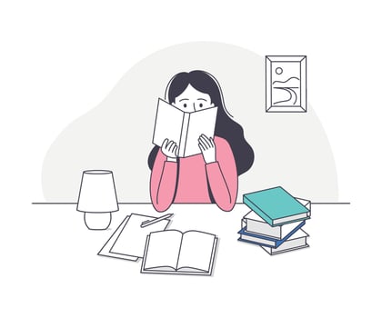 Woman reading with books on a desk vector