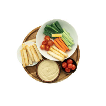 Vegetable sticks with hummus dip and bread sticks isolated on transparent background png