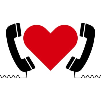 Romantic Communication Concept with Red Heart and Retro Telephone Handsets Illustration. Two black retro telephone handsets facing each other with a bold red heart placed between them. vector